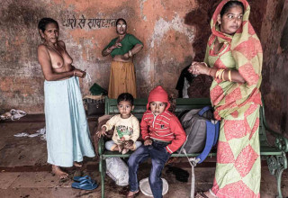 women changes their clothes after ritual.