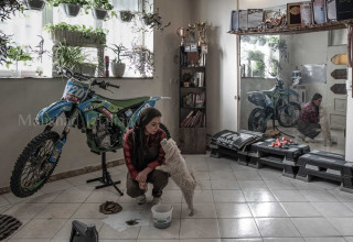 Samaneh lives at home with her dogs.