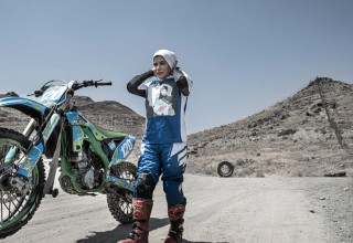 She is wearing the right clothes for training and is ready for training on the track.