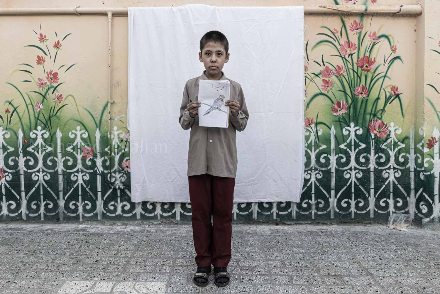 Samir Abdolkhaligh, who is 14 years old moved 3 months ago from Kabul. He studied at grade 6 however he is going to study at grade 4 in Iran.
